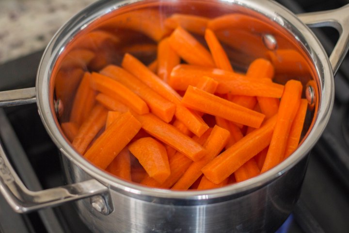 Add carrots to boiling water