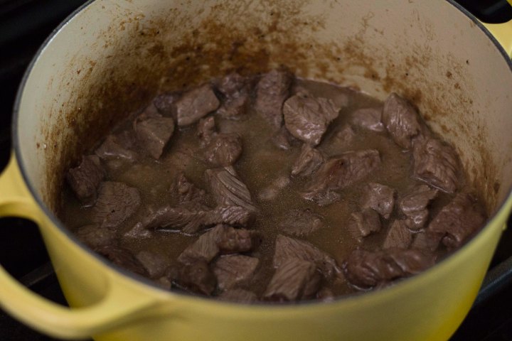 add liquid to browned meat