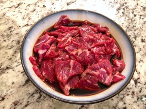 marinate in soy sauce