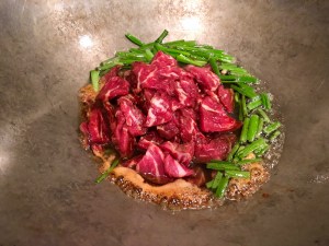 add the marinated beef